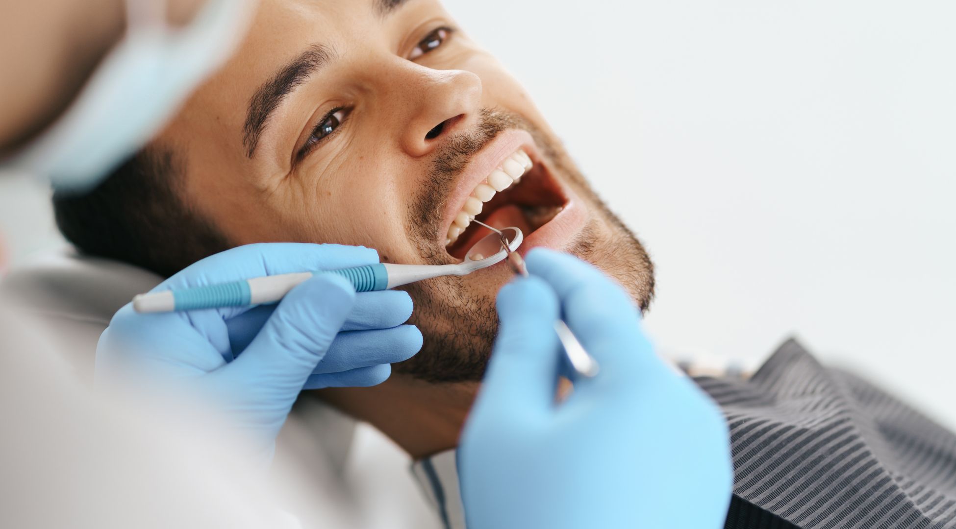 Patient receiving a dental check-up in Cape Town clinic—relevant visual for SEO for dentists Cape Town.